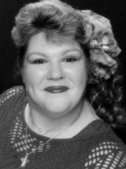 Headshot of Nancy C Caralla.