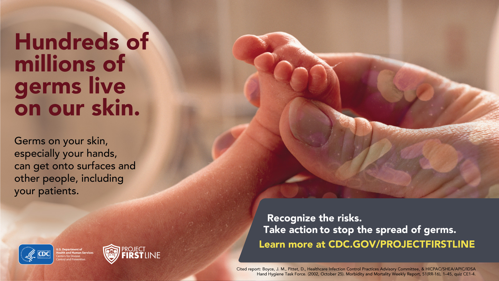 Image of a hand with germs on it, holding the foot of an infant