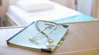 Patient file and stethoscope