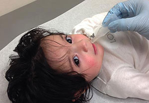 vaccinating-girl-temp.jpg Girl receiving rotavirus vaccine