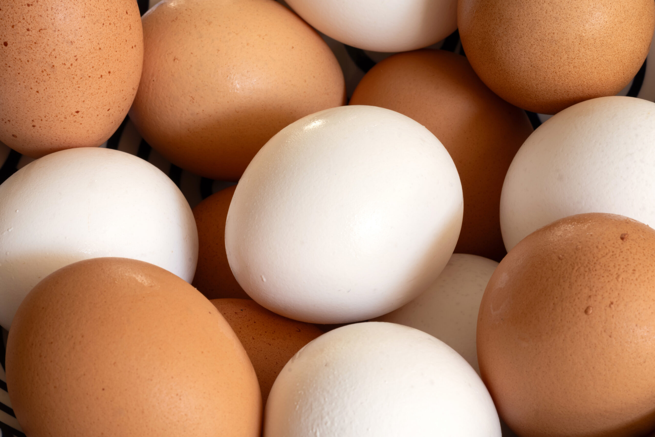 Brown and white chicken eggs