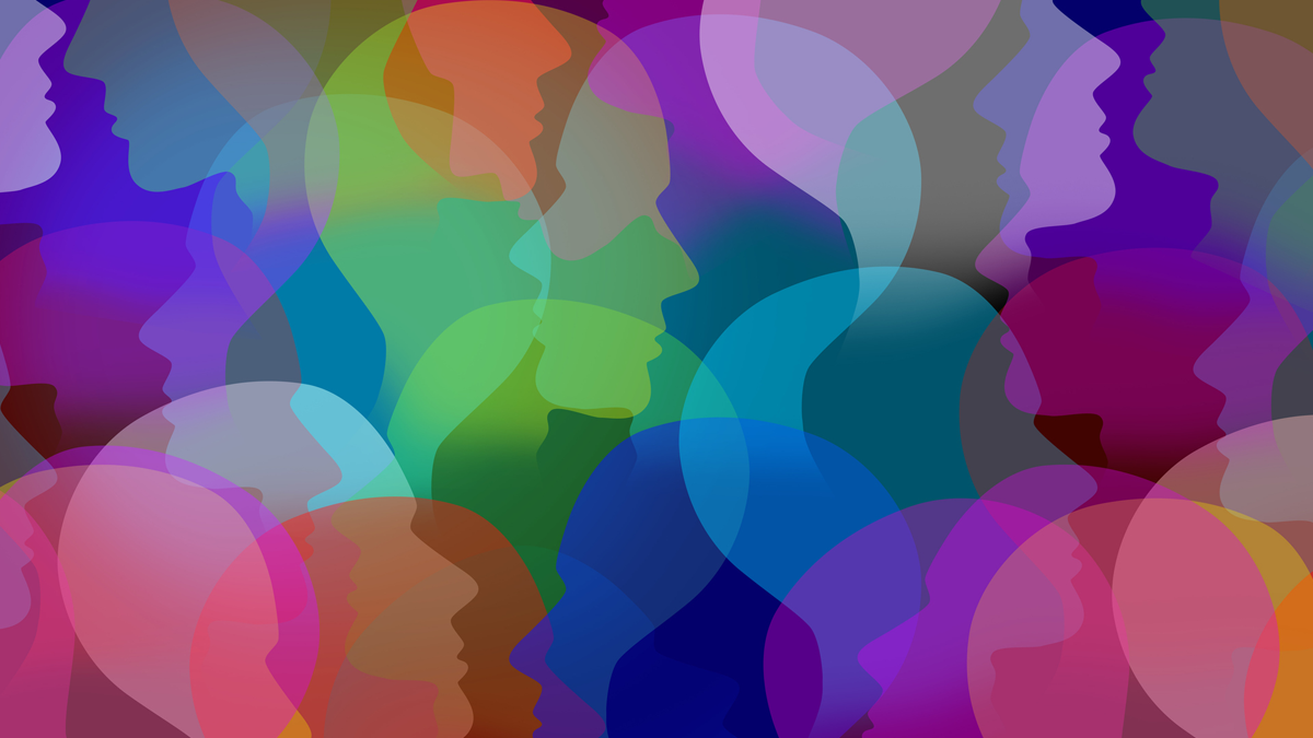 Silhouettes of human faces in a spectrum of shades