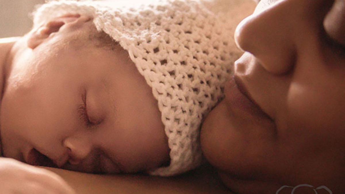 mom holding stillborn infant