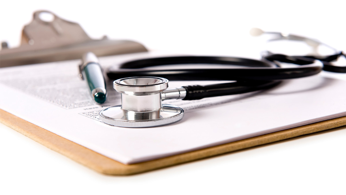 Clipboard with a stethoscope on top