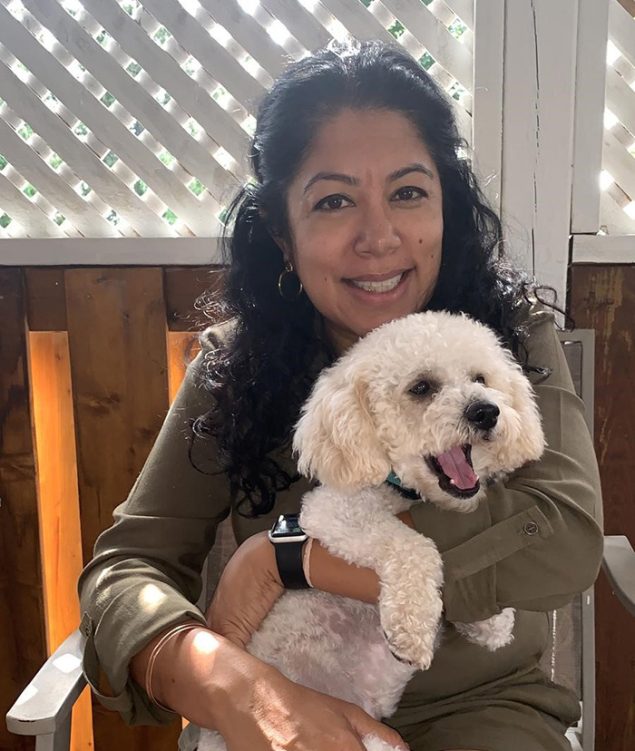 Radhika700pxmedium.jpg Photo of Radhika Sawh and her dog.