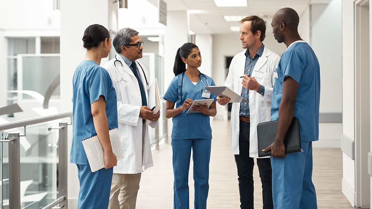 Diverse group of doctors talking