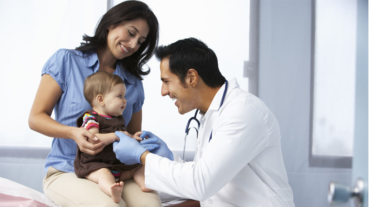 hispanic-latino-health-burden-physician Women with infant and doctor