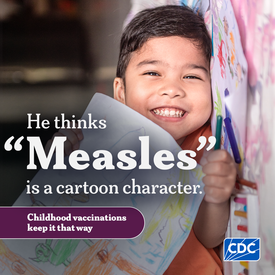 Child smiling with coloring tools and paper. Text overlay includes He thinks "Measles" is a cartoon character. Childhood vaccines keep it that way.