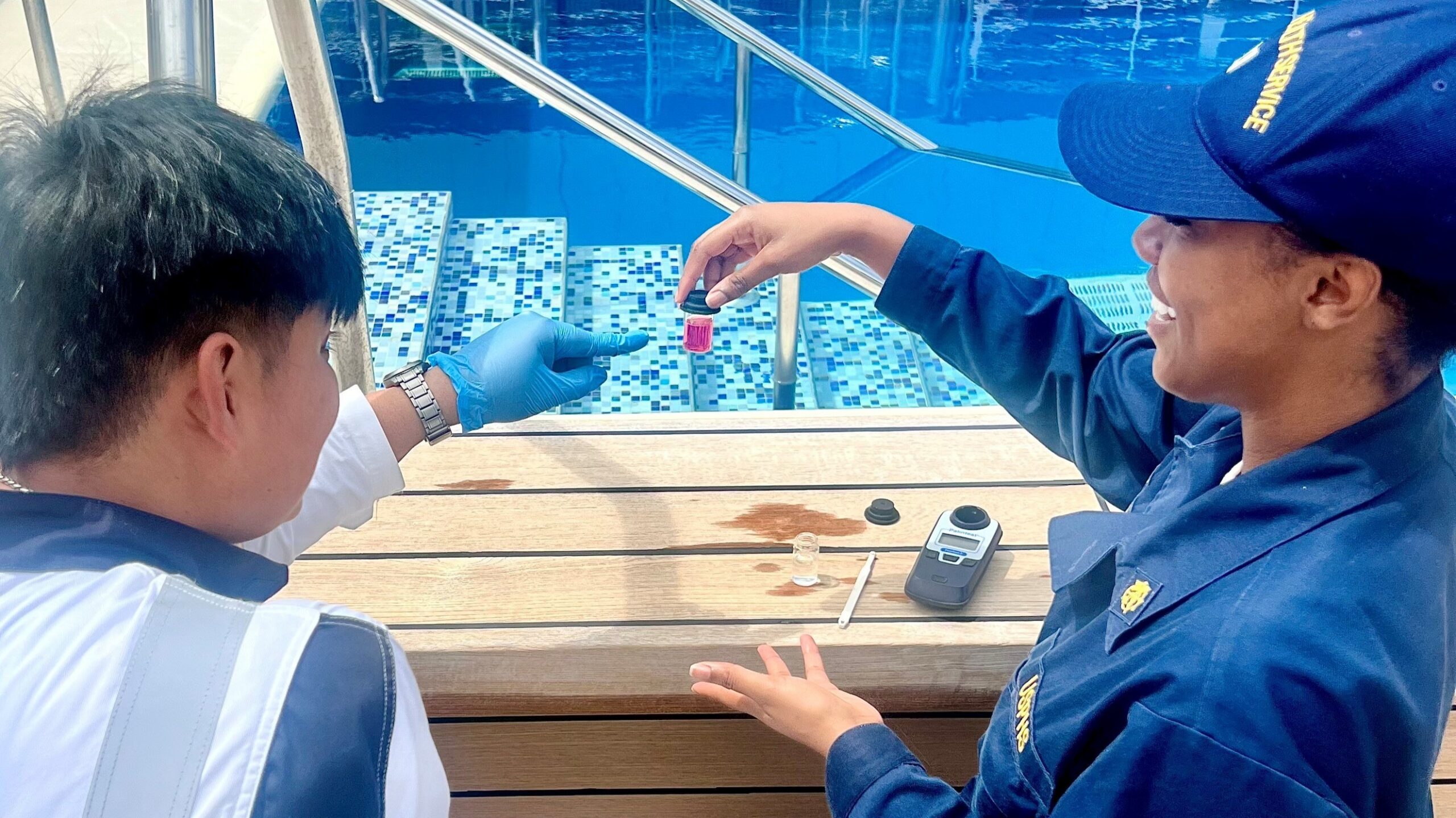 VSP inspector testing a sample of pool water on a cruise ship.
