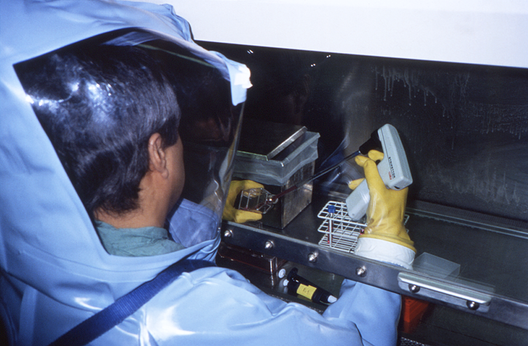 A CDC scientist works in a BSL-4 laboratory
