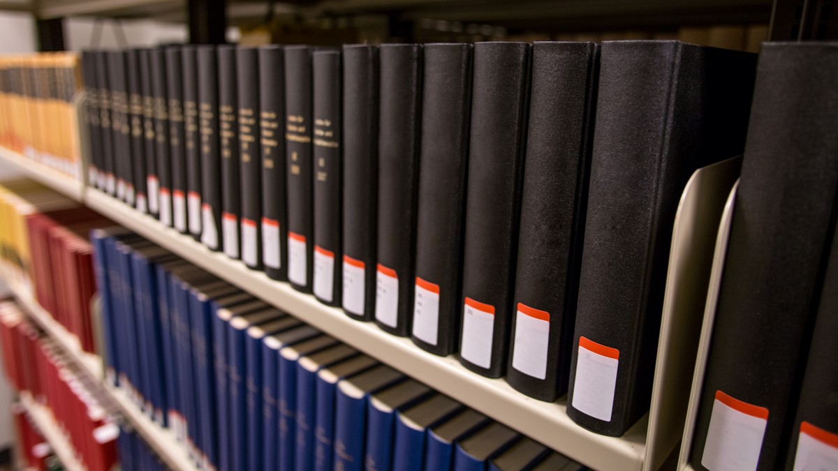 Rows of bound reports in a library.